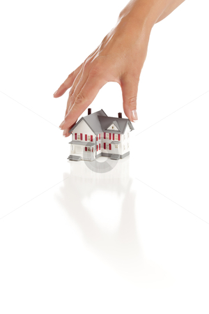 To use this stock image in your creative project, please select the size you need over to the right and click the "Add to Cart" button.
Your downloaded image will come with the Cutcaster watermark removed so don’t worry about the watermark you see on this page. Womans Hand Choosing A Home on White stock photo, Womans Hand Choosing A Home on a White Background. by Andy Dean