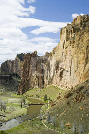 To use this stock image in your creative project, please select the size you need over to the right and click the "Add to Cart" button.
Your downloaded image will come with the Cutcaster watermark removed so don’t worry about the watermark you see on this page. Smith Rock State Park in Oregon USA, nature stock photography stock photo, Smith Rocks State Park, Oregon by Bryan Mullennix