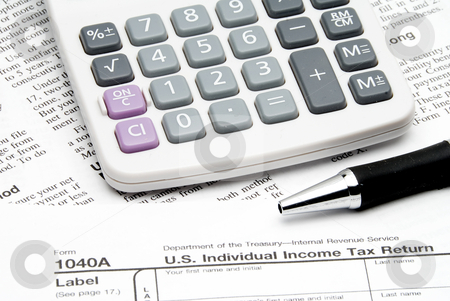 To use this stock image in your creative project, please select the size you need over to the right and click the "Add to Cart" button.
Your downloaded image will come with the Cutcaster watermark removed so don’t worry about the watermark you see on this page. Tax Return stock photo, A calculator sitting on top of tax forms. by Robert Byron