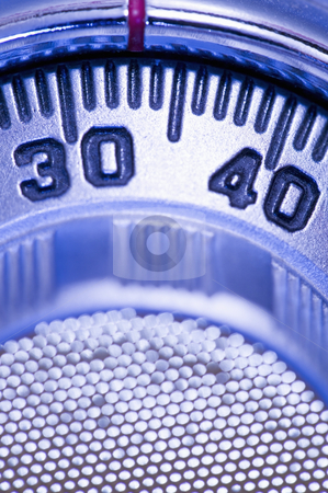 To use this stock image in your creative project, please select the size you need over to the right and click the "Add to Cart" button.
Your downloaded image will come with the Cutcaster watermark removed so don’t worry about the watermark you see on this page. Combination lock stock photo, Combination lock on safe, concept photography by Bryan Mullennix