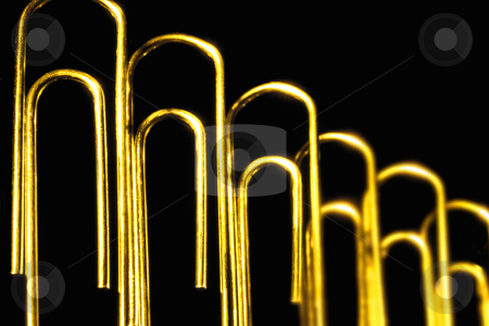 To use this stock image in your creative project, please select the size you need over to the right and click the "Add to Cart" button.
Your downloaded image will come with the Cutcaster watermark removed so don’t worry about the watermark you see on this page. Paperclips stock photo, Paperclips on black background, concept photography by Bryan Mullennix