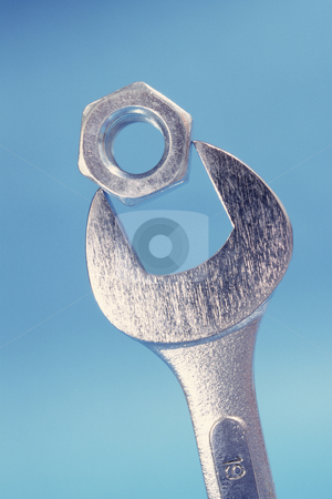 To use this stock image in your creative project, please select the size you need over to the right and click the "Add to Cart" button.
Your downloaded image will come with the Cutcaster watermark removed so don’t worry about the watermark you see on this page. Wrench, concept photography stock photo, Metal wrench and nut, concept photography by Bryan Mullennix