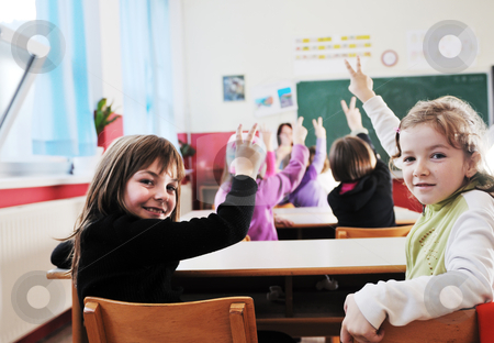 To use this stock image in your creative project, please select the size you need over to the right and click the "Add to Cart" button.
Your downloaded image will come with the Cutcaster watermark removed so don’t worry about the watermark you see on this page. Happy kids with teacher in school classroom stock photo, happy young teacher woman at elementrary school teaching and giving leassons to group of young smart children by Benis Arapovic