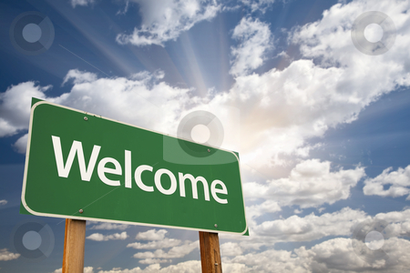 To use this stock image in your creative project, please select the size you need over to the right and click the "Add to Cart" button.
Your downloaded image will come with the Cutcaster watermark removed so don’t worry about the watermark you see on this page. Welcome Green Road Sign Against Clouds stock photo, Welcome Green Road Sign Against Clouds and Sunburst. by Andy Dean
