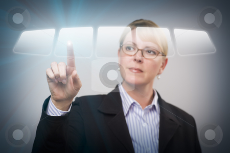 To use this stock image in your creative project, please select the size you need over to the right and click the "Add to Cart" button.
Your downloaded image will come with the Cutcaster watermark removed so don’t worry about the watermark you see on this page. Woman Pushing an Interactive Touch Screen Button stock photo, Attractive Blonde Woman Using an Interactive Touch Screen. by Andy Dean