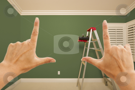To use this stock image in your creative project, please select the size you need over to the right and click the "Add to Cart" button.
Your downloaded image will come with the Cutcaster watermark removed so don’t worry about the watermark you see on this page. Hands Framing Green Painted Wall Interior stock photo, Hands Framing Green Painted Room Wall Interior with Ladder, Paint Bucket and Rollers. by Andy Dean
