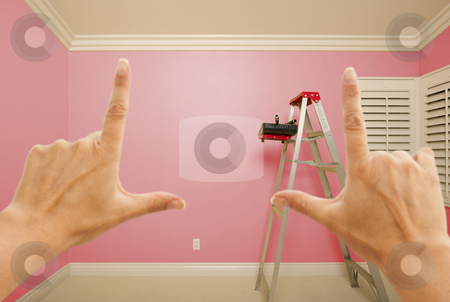 To use this stock image in your creative project, please select the size you need over to the right and click the "Add to Cart" button.
Your downloaded image will come with the Cutcaster watermark removed so don’t worry about the watermark you see on this page. Hands Framing Pink Painted Wall Interior stock photo, Hands Framing Pink Painted Room Wall Interior with Ladder, Paint Bucket and Rollers. by Andy Dean