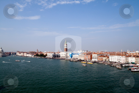 To use this stock image in your creative project, please select the size you need over to the right and click the "Add to Cart" button.
Your downloaded image will come with the Cutcaster watermark removed so don’t worry about the watermark you see on this page. Venice Italy stock photo, September 25th, 2009 Venice, Italy The Piazza San Marcos known its famous bell tower and Basilica by Kevin Tietz