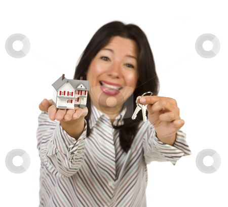 To use this stock image in your creative project, please select the size you need over to the right and click the "Add to Cart" button.
Your downloaded image will come with the Cutcaster watermark removed so don’t worry about the watermark you see on this page. Attractive Multiethnic Woman Holding Small House and Keys stock photo, Attractive Multiethnic Woman Holding Small House and Keys Isolated on a White Background - Focus is on the house and keys. by Andy Dean