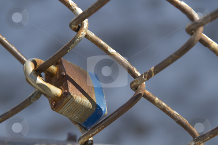 To use this stock image in your creative project, please select the size you need over to the right and click the "Add to Cart" button.
Your downloaded image will come with the Cutcaster watermark removed so don’t worry about the watermark you see on this page. Padlock fence stock photo, Close up view of a rusted pad lock attach to a chain link fence by Yann Poirier