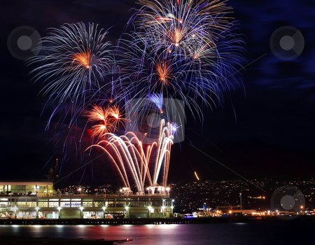 To use this stock image in your creative project, please select the size you need over to the right and click the "Add to Cart" button.
Your downloaded image will come with the Cutcaster watermark removed so don’t worry about the watermark you see on this page. Red Blue White Fireworks Vancouver Harbor British Columbia stock photo, Red Blue White Fireworks Vancouver Harbor Canada Day British Columbia Pacific Northwest by William Perry