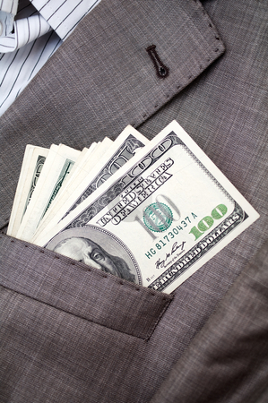To use this stock image in your creative project, please select the size you need over to the right and click the "Add to Cart" button.
Your downloaded image will come with the Cutcaster watermark removed so don’t worry about the watermark you see on this page. Dollars in the pocket of business suit stock photo, one hundred dollars in the pocket of business suit by Illustrart