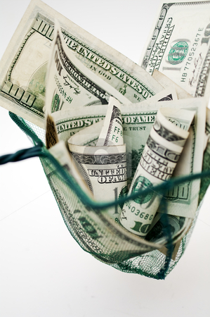 To use this stock image in your creative project, please select the size you need over to the right and click the "Add to Cart" button.
Your downloaded image will come with the Cutcaster watermark removed so don’t worry about the watermark you see on this page. Dollars in fishing net stock photo, one hundred dollar bills in fishing net by Illustrart