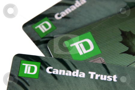 To use this stock image in your creative project, please select the size you need over to the right and click the "Add to Cart" button.
Your downloaded image will come with the Cutcaster watermark removed so don’t worry about the watermark you see on this page. TD Bank Cards stock photo, Toronto, Ontario, Canada - July 2, 2011: A closeup of three TD Canada Trust bank cards. TD Canada Trust is one of the biggest banks in Canada. They also operate internationally. by Chris Hill