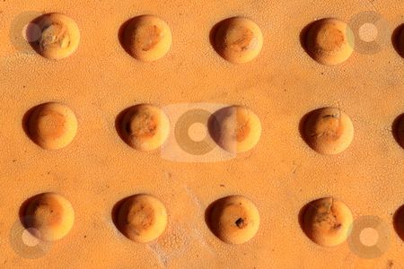 To use this stock image in your creative project, please select the size you need over to the right and click the "Add to Cart" button.
Your downloaded image will come with the Cutcaster watermark removed so don’t worry about the watermark you see on this page. Yellow Metal Dots stock photo, yellow metal dotted textured surface with shadows by Henrik Lehnerer