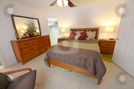 To use this stock image in your creative project, please select the size you need over to the right and click the "Add to Cart" button.
Your downloaded image will come with the Cutcaster watermark removed so don’t worry about the watermark you see on this page. King Master Bedroom stock photo, A King Master Bedroom, Interior shot of a Home. by Lucy Clark