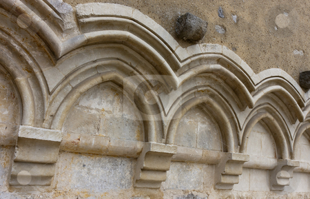 To use this stock image in your creative project, please select the size you need over to the right and click the "Add to Cart" button.
Your downloaded image will come with the Cutcaster watermark removed so don’t worry about the watermark you see on this page. Gothic arches on a wall stock photo, cascade of traditional gothic arches with simple archivolts on a religious building wall by Alexander Pastukh