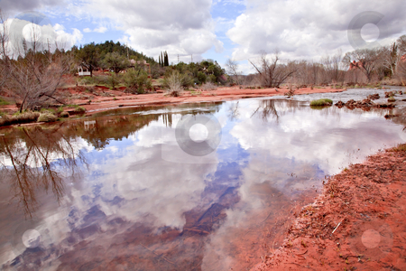 To use this stock image in your creative project, please select the size you need over to the right and click the "Add to Cart" button.
Your downloaded image will come with the Cutcaster watermark removed so don’t worry about the watermark you see on this page. Oak Creek Downstream Reflection Sedona Arizona stock photo, Oak Creek Downstream Fair Weather Reflection Sedona Arizona by William Perry