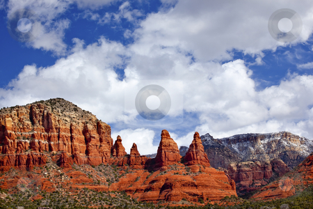 To use this stock image in your creative project, please select the size you need over to the right and click the "Add to Cart" button.
Your downloaded image will come with the Cutcaster watermark removed so don’t worry about the watermark you see on this page. Madonna Nuns Orange Red Rock Canyon Big Blue Cloudy Sky Sedona A stock photo, Madonna Nuns Orange Red Rock Canyon Big Blue Cloudy Sky Green Trees Snow Sedona Arizona by William Perry