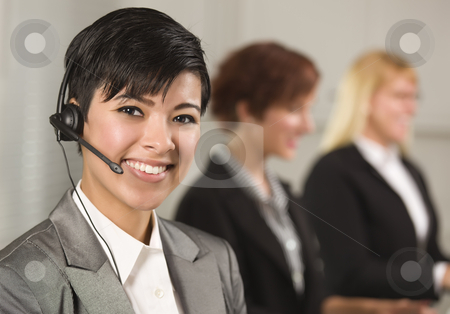 To use this stock image in your creative project, please select the size you need over to the right and click the "Add to Cart" button.
Your downloaded image will come with the Cutcaster watermark removed so don’t worry about the watermark you see on this page. Pretty Hispanic Businesswoman with Colleagues Behind stock photo, Pretty Hispanic Businesswoman with Colleagues Behind in an Office Setting. by Andy Dean